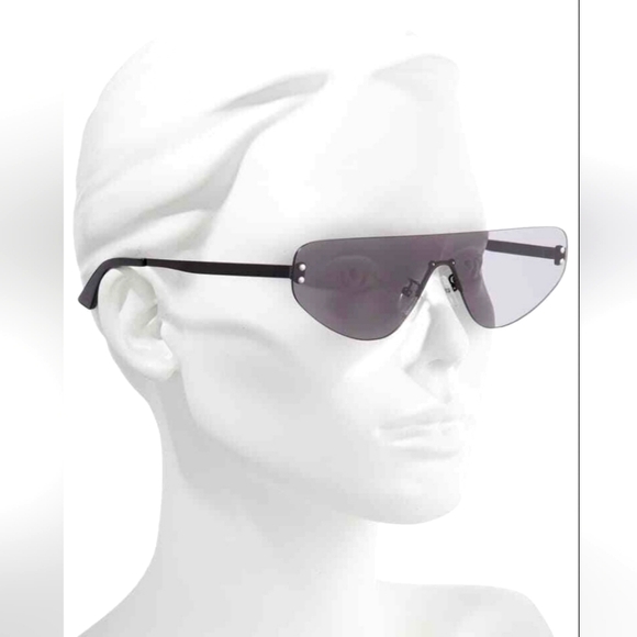 McQ by Alexander McQueen Accessories - Alexander McQueen Rimless Grey Sunglasses